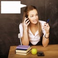 Young pretty girl student in classroom at blackboard Royalty Free Stock Photo