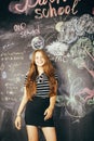 Young pretty girl student in classroom at Royalty Free Stock Photo