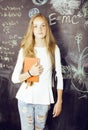 Young pretty girl student in classroom at Royalty Free Stock Photo