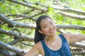 Young pretty and happy Asian Chinese woman taking a walk excursion trip on tropical mountain enjoying nature smiling cheerful in h Royalty Free Stock Photo