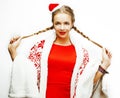 Young pretty happy smiling woman on christmas in santas red hat Royalty Free Stock Photo