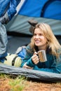 Young pretty hiker lying in a tent Royalty Free Stock Photo