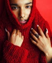 Young pretty indian girl in red sweater posing emotional, fashion hipster teenage, lifestyle people concept