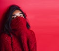 young pretty indian girl in red sweater posing emotional, fashion hipster teenage, lifestyle people concept