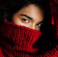 Young pretty indian mulatto girl in red sweater posing emotional Royalty Free Stock Photo