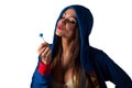 Young Pretty Latino Woman eating a lolly-pop Royalty Free Stock Photo