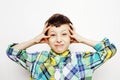 Young pretty little boy kid wondering, posing emotional face isolated on white background, gesture happy smiling close Royalty Free Stock Photo