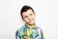 Young pretty little boy kid wondering, posing emotional face isolated on white background, gesture happy smiling close Royalty Free Stock Photo