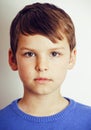 Young pretty little cute boy kid wondering, posing emotional face isolated on white background, gesture happy smiling Royalty Free Stock Photo