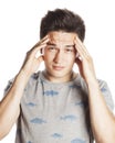 Young pretty man with head ache holding hands Royalty Free Stock Photo