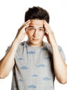 Young pretty man with head ache holding hands Royalty Free Stock Photo