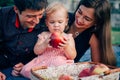 Young pretty mother, father and their little cute daughter Royalty Free Stock Photo