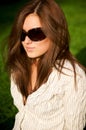 Young pretty pensive girl in sunglasses Royalty Free Stock Photo