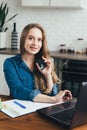 Pregnant girl works at home in self-isolation mode in quarantine and makes online purchases Royalty Free Stock Photo