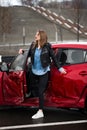 Young pretty scared woman in the car. Injured woman feeling bad after having a car crash. Royalty Free Stock Photo