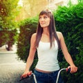 Young pretty woman retro hipster style outdoor portrait Royalty Free Stock Photo