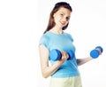 Young pretty slim blond woman with dumbbell isolated cheerful sm Royalty Free Stock Photo