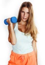 young pretty slim blond woman with dumbbell isolated cheerful smiling, measuring herself, diet people concept on white Royalty Free Stock Photo