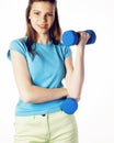 Young pretty slim blond woman with dumbbell isolated cheerful smiling, measuring herself, diet people concept on white Royalty Free Stock Photo