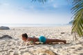 Young pretty slim brunette woman practise yoga pose on tropical Royalty Free Stock Photo