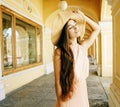 Young pretty smiling woman in hat with bags on shopping at store Royalty Free Stock Photo