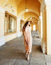 Young pretty smiling woman in hat with bags on shopping at store Royalty Free Stock Photo