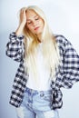 Young pretty stylish blond hipster girl posing emotional isolate Royalty Free Stock Photo