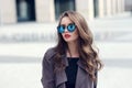 Young pretty stylish girl in sunglasses Royalty Free Stock Photo