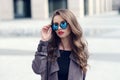 Young pretty stylish girl in sunglasses Royalty Free Stock Photo