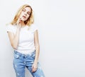 Young pretty stylish hipster blond girl posing emotional isolated on white background happy smiling cool smile Royalty Free Stock Photo