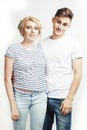 Young pretty teenage couple, hipster guy with his girlfriend happy smiling and hugging isolated on white background Royalty Free Stock Photo