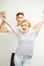 Young pretty teenage couple, hipster guy with his girlfriend happy smiling and hugging isolated on white background Royalty Free Stock Photo