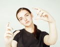 Young pretty teenage girl making selfie isolated on white background close up Royalty Free Stock Photo