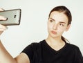 Young pretty teenage girl making selfie isolated on white background close up Royalty Free Stock Photo