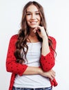 Young pretty teenage hipster girl posing emotional happy smiling on white background, lifestyle people concept Royalty Free Stock Photo