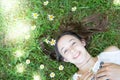 pretty teenager girl on a meadow with flowers and sun Royalty Free Stock Photo