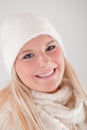 Young pretty winter woman in knit scarf and hat Royalty Free Stock Photo