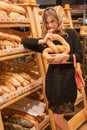 Pretty woman in the bread depatment