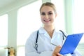 Young pretty woman doctor indoor Royalty Free Stock Photo