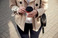Close up woman`s hands holding cup of coffee. Royalty Free Stock Photo