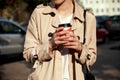 Close up woman`s hands holding cup of coffee. Royalty Free Stock Photo