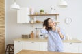 Young pretty woman drinking her morning coffee at kitchen Royalty Free Stock Photo