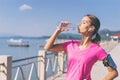 Young pretty woman drinking water Royalty Free Stock Photo