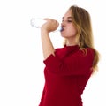 Young pretty woman drinks water Bottle or glass of spring water Royalty Free Stock Photo