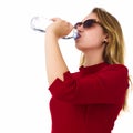 Young pretty woman drinks water Bottle or glass of spring water Royalty Free Stock Photo