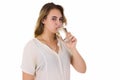 Young pretty woman drinks water Bottle or glass of spring water Royalty Free Stock Photo