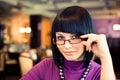 Young woman in glasses