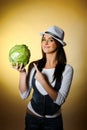 Young pretty woman with green cabbage smiling Royalty Free Stock Photo