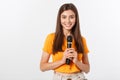 Young pretty woman happy and motivated, singing a song with a microphone, presenting an event or having a party, enjoy Royalty Free Stock Photo