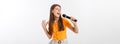 Young pretty woman happy and motivated, singing a song with a microphone, presenting an event or having a party, enjoy Royalty Free Stock Photo